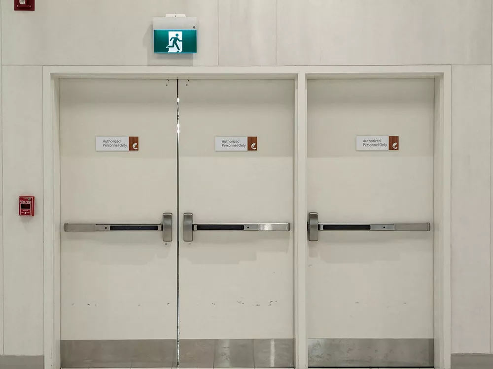 Camax's rim exit devices on singles doors and double doors